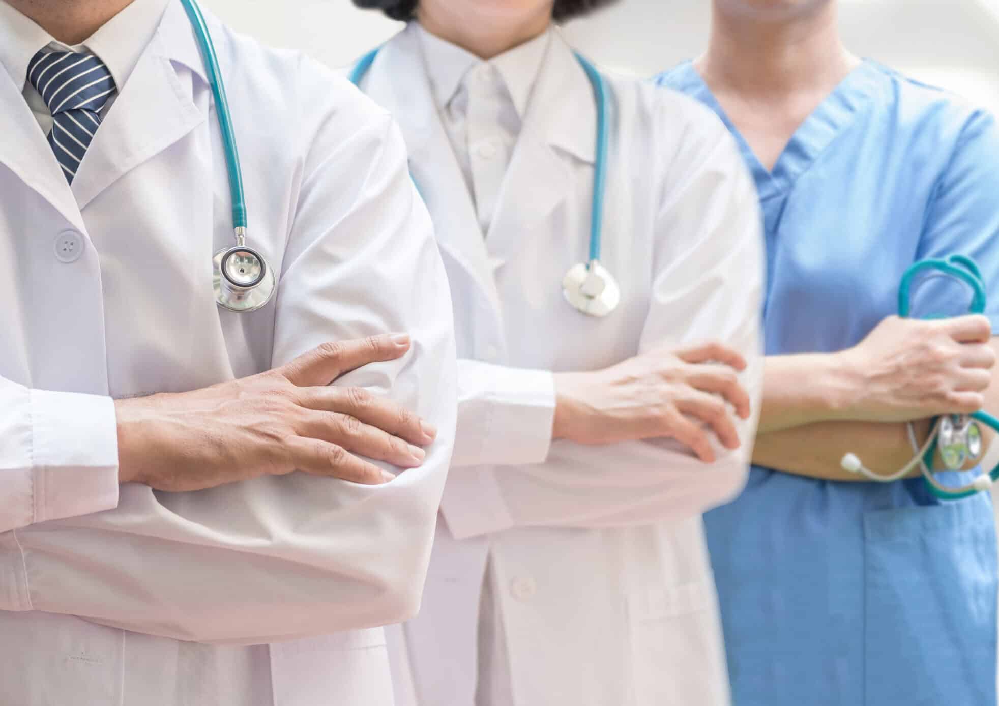 Doctor and surgeon professional team with medical clinic background for nursing care professional teamwork and patient trust in hospitaland clinic concept