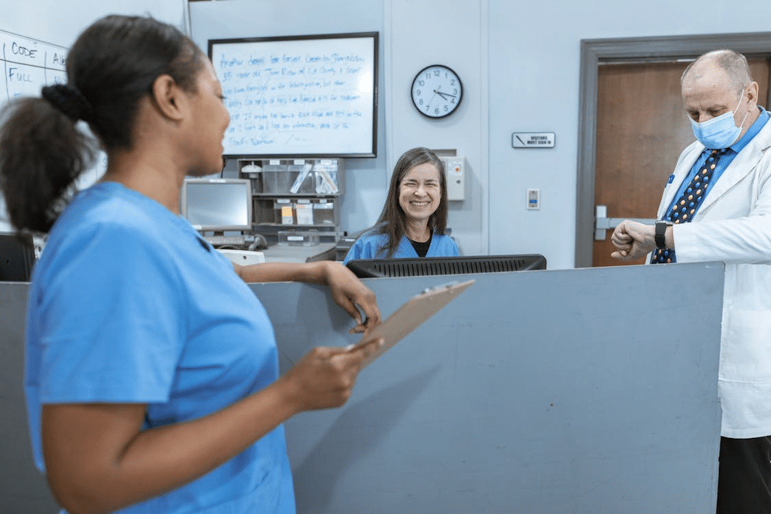 Nurses and doctor discussion